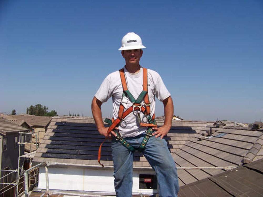 Solar Systems in Greater Los Angeles Area, California Worker On Roof